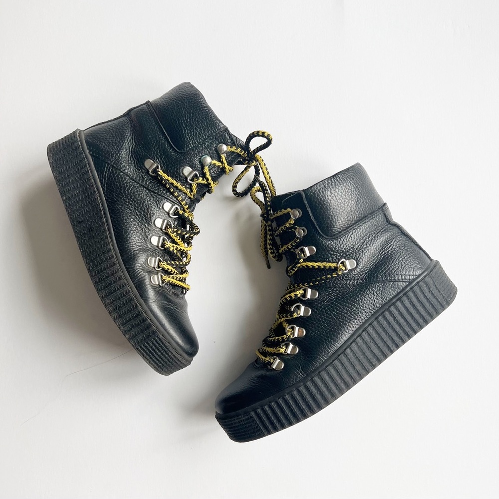 Black Lace Up Boots with Yellow Accents
